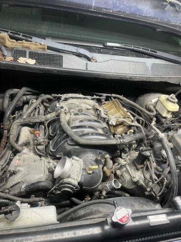 Blue Ford Mustang GT V8 engine bay with hood up at TOP CONCEPT Philadelphia auto repair