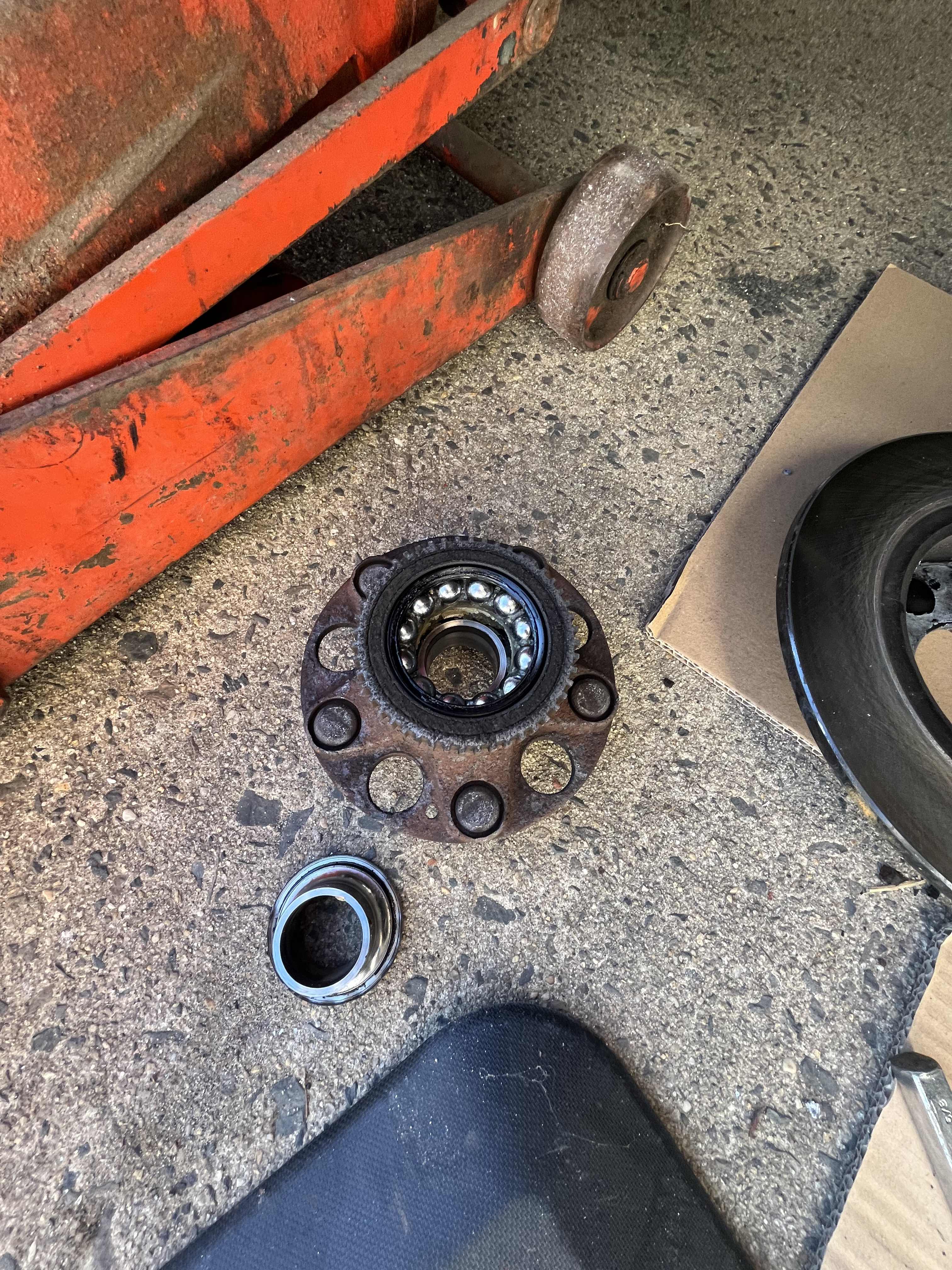 Honda Accord front wheel hub assembly removed showing failed inner bearing race at TOP CONCEPT Philadelphia