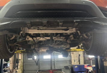 BMW on lift undercarriage tire service Philadelphia