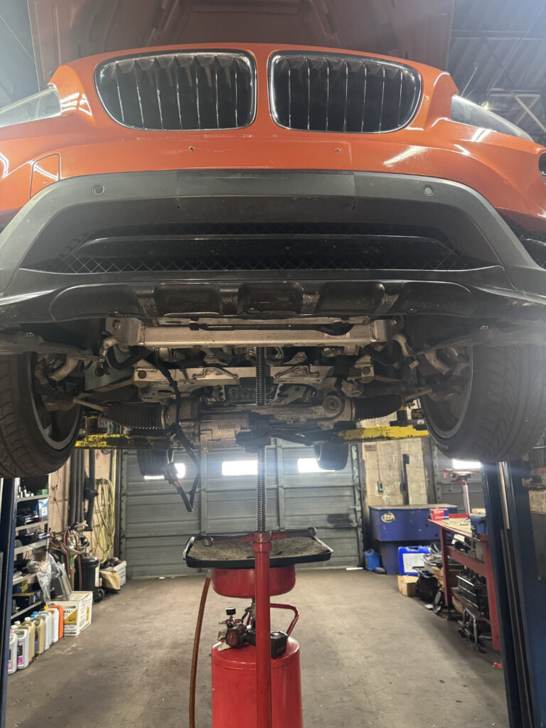 Bmw On Lift   Undercarriage Service – TOP CONCEPT LLC Philadelphia