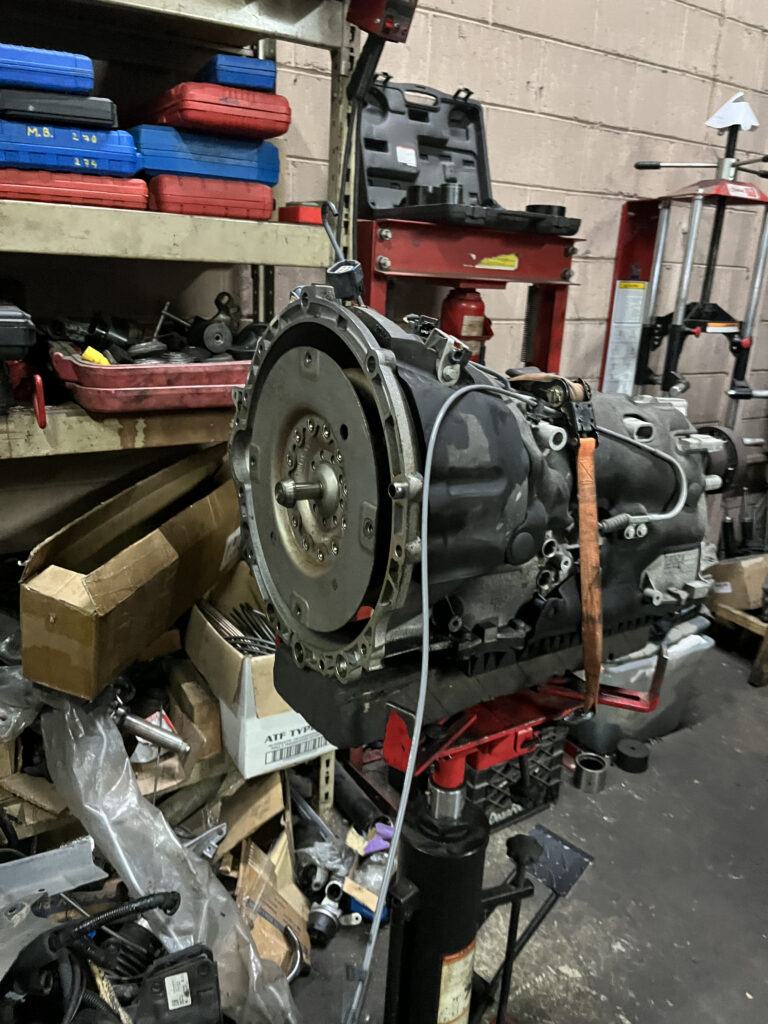 Engine And Transmission Assembly On Stand – TOP CONCEPT LLC Philadelphia
