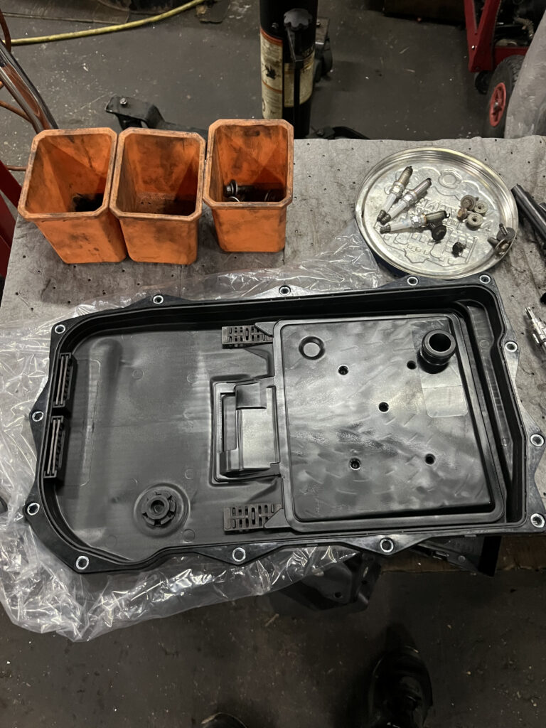 Transmission Pan And Filter On Bench – TOP CONCEPT LLC Philadelphia